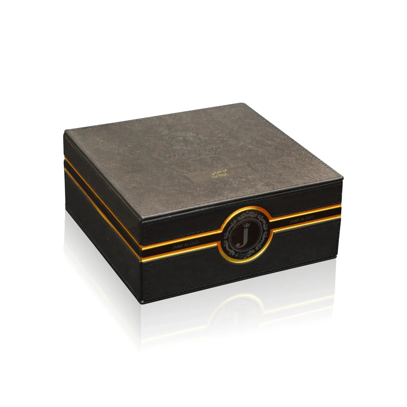 Jamr Al Oud luxury perfume gift box with black and gold accents on white background