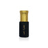Luxury Jamr Al Oud perfume bottle with gold cap and elegant Arabic script on black.