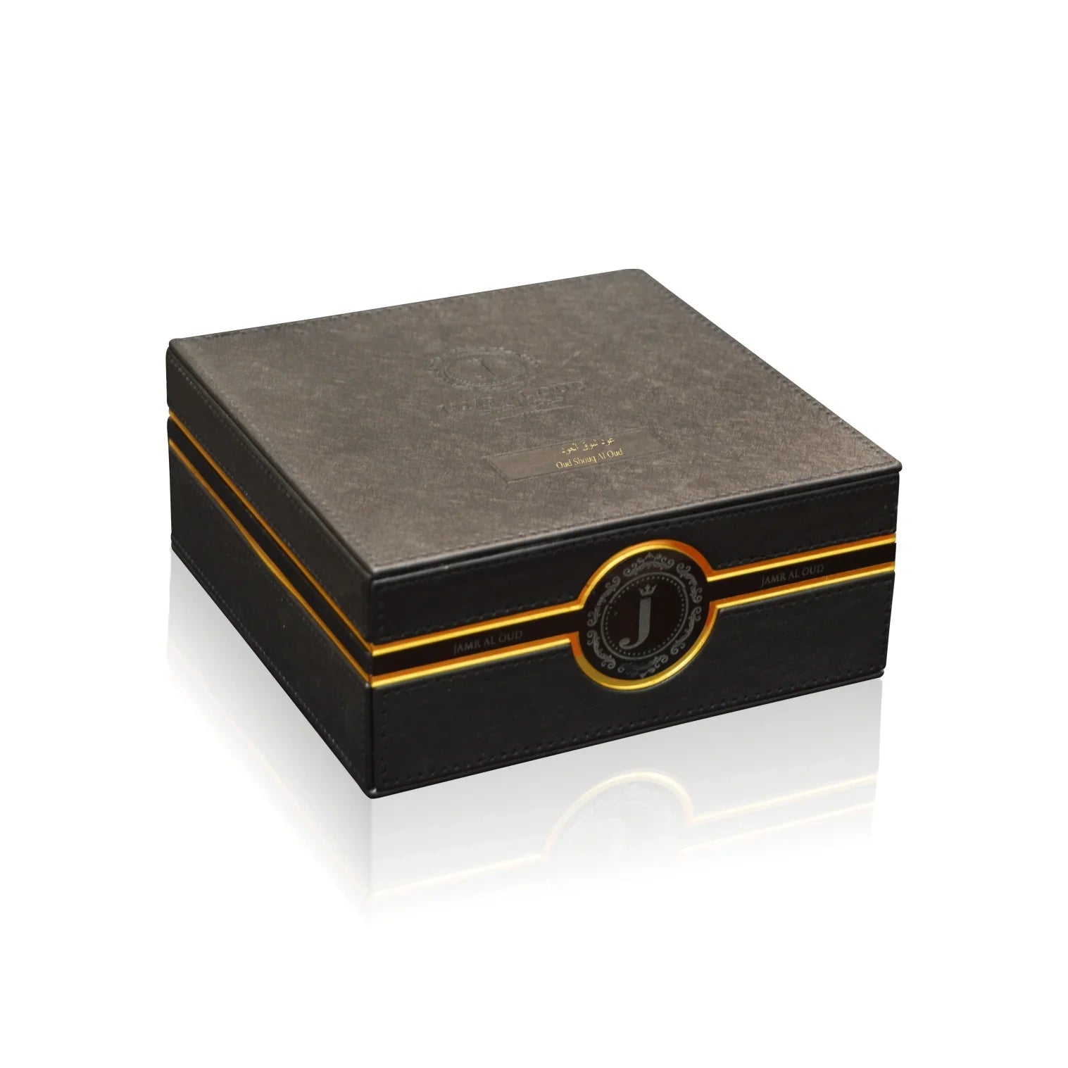 Elegant Jamr Al Oud black luxury perfume gift box with gold accents on white background.