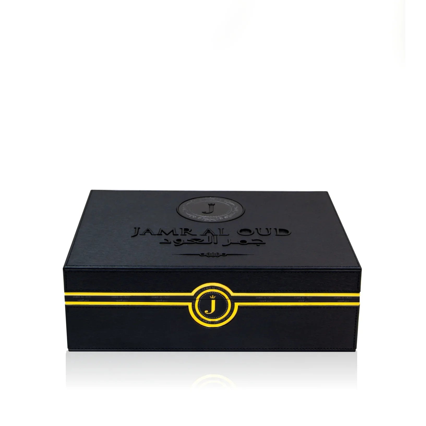 Jamr Al Oud black luxury perfume gift box with gold accents and embossed logo