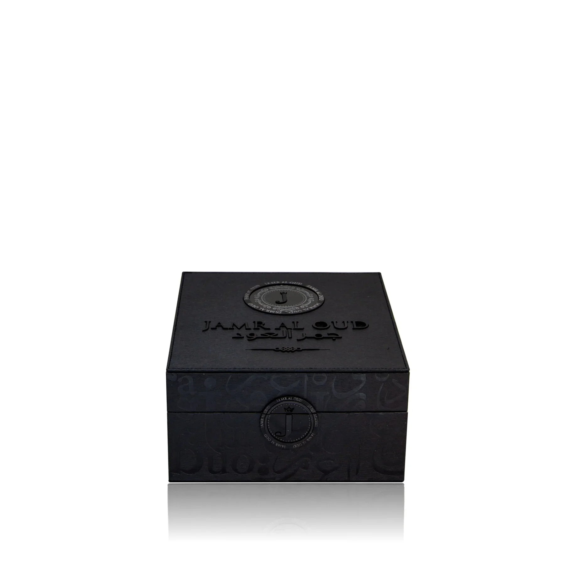 Luxury black Jamr Al Oud perfume gift box with embossed logo and elegant design