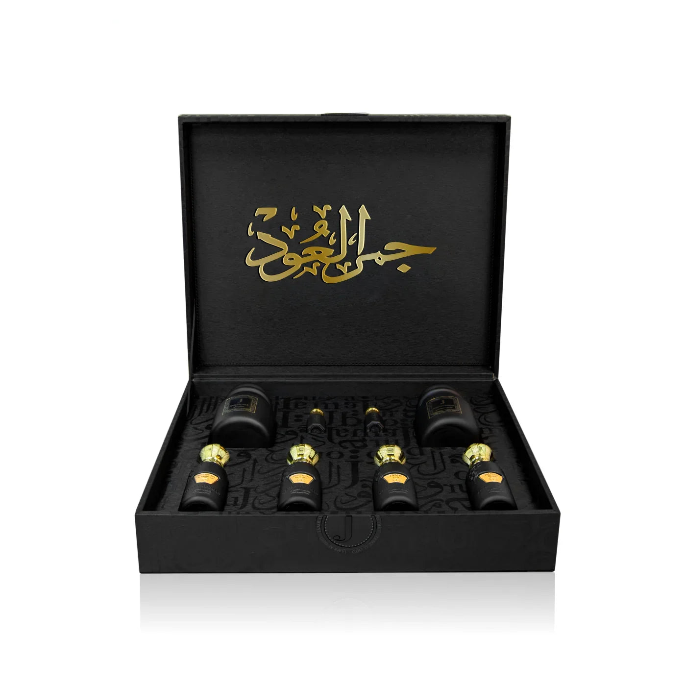 Luxury Jamr Al Oud Perfumes gift box with elegant black and gold fragrance bottles