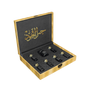 Luxury Jamr Al Oud Perfumes gift box with black and gold perfume bottles displayed