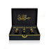 Luxury Jamr Al Oud gift box with three elegant perfume bottles, black and gold design.