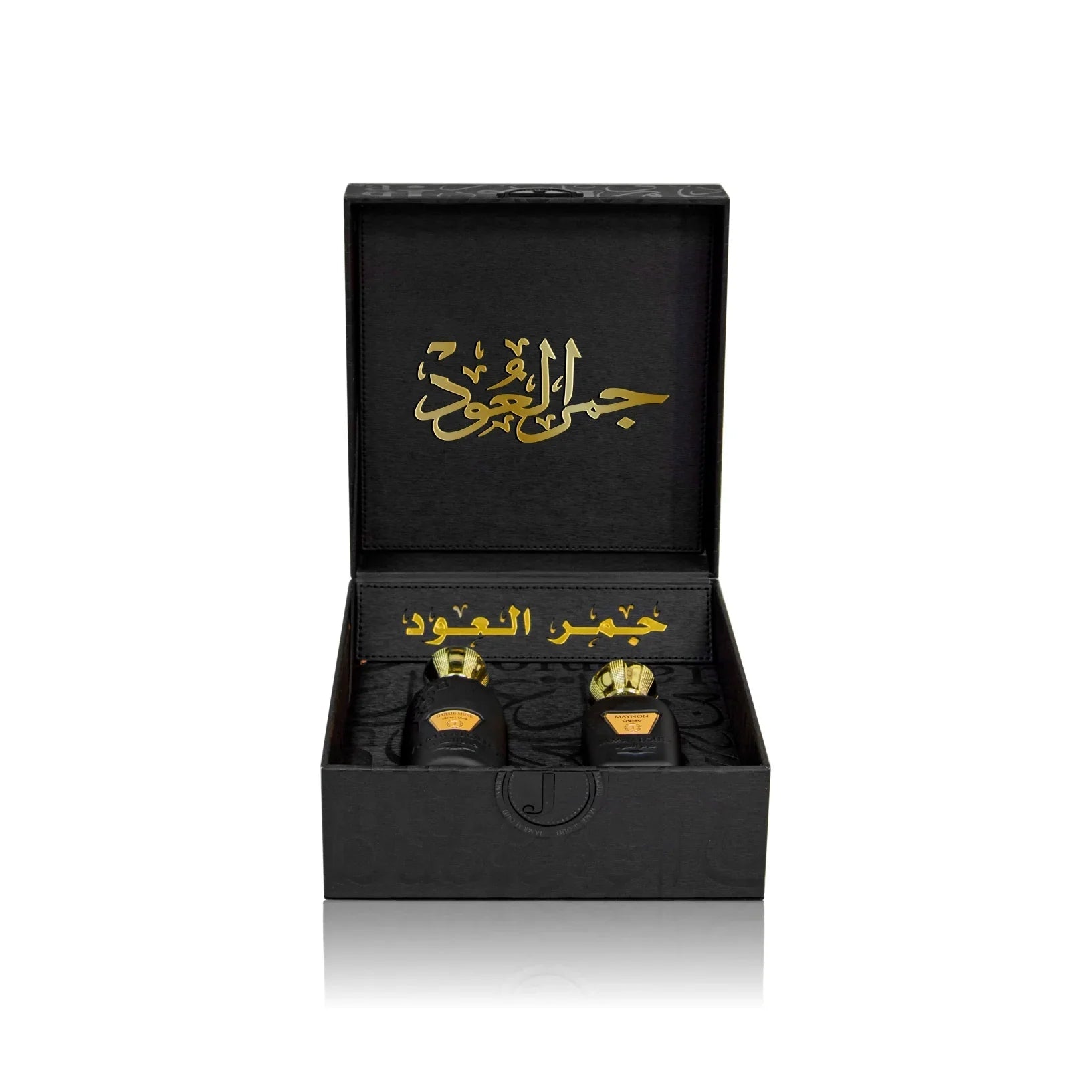 Luxury Jamr Al Oud gift box with two elegant black and gold perfume bottles