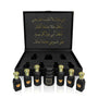 Luxury Jamr Al Oud perfumes gift box with six elegant black bottles and gold Arabic script