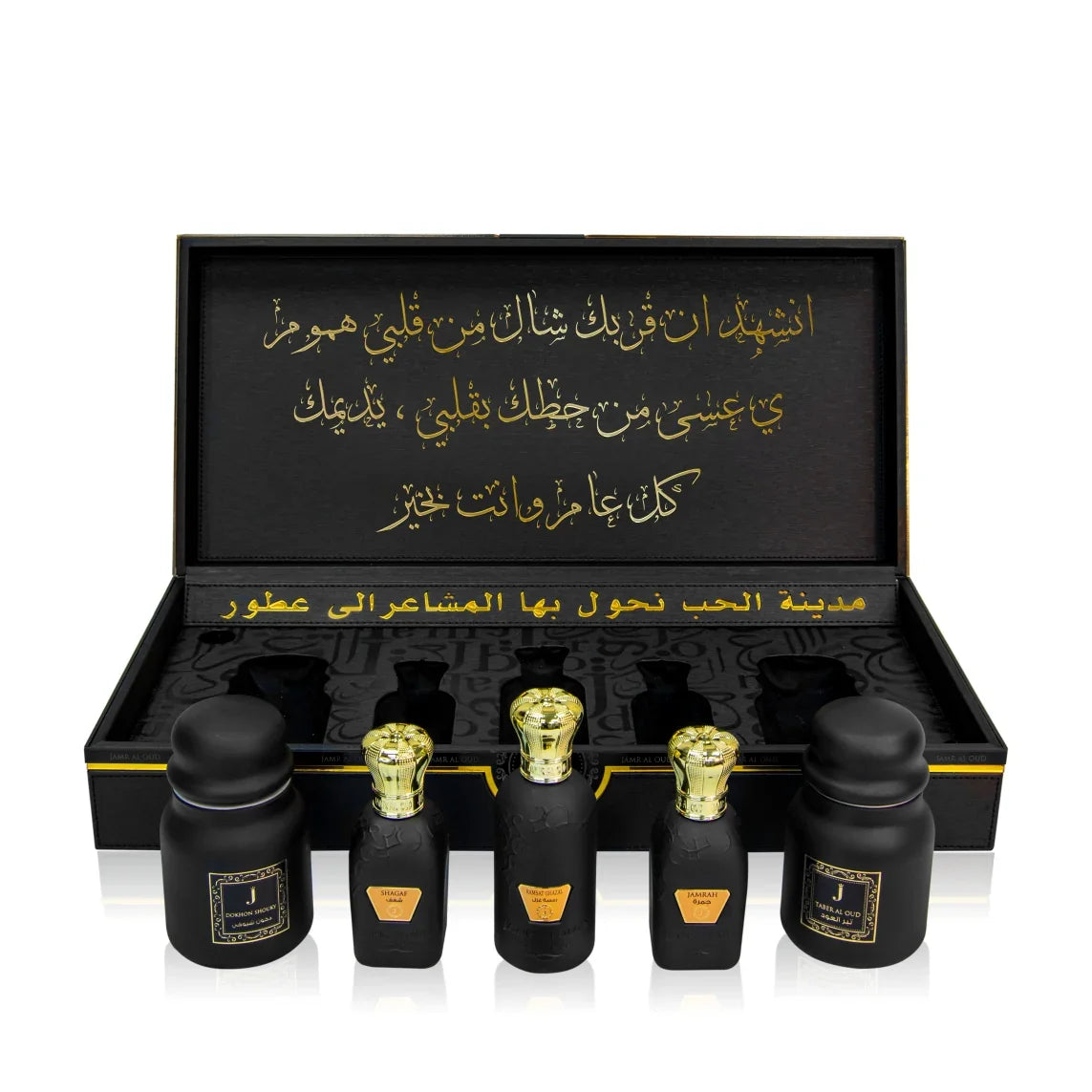 Luxury Jamr Al Oud perfume gift box set with elegant black and gold bottles and Arabic script.