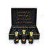 Luxury Jamr Al Oud perfume gift box with three elegant black and gold perfume bottles
