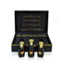 Luxury Jamr Al Oud perfume gift box with three elegant black and gold perfume bottles