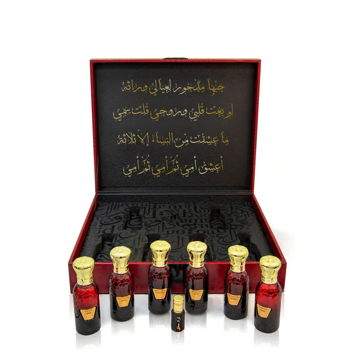 Luxury Jamr Al Oud oriental perfume set in a red gift box with gold Arabic script.