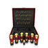 Luxury Jamr Al Oud oriental perfume set in a red gift box with gold Arabic script.