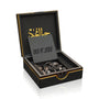 Luxury Jamr Al Oud black gift box with oud wood chips and gold Arabic logo