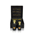 Luxury Jamr Al Oud gift box with two elegant black perfume bottles and gold caps