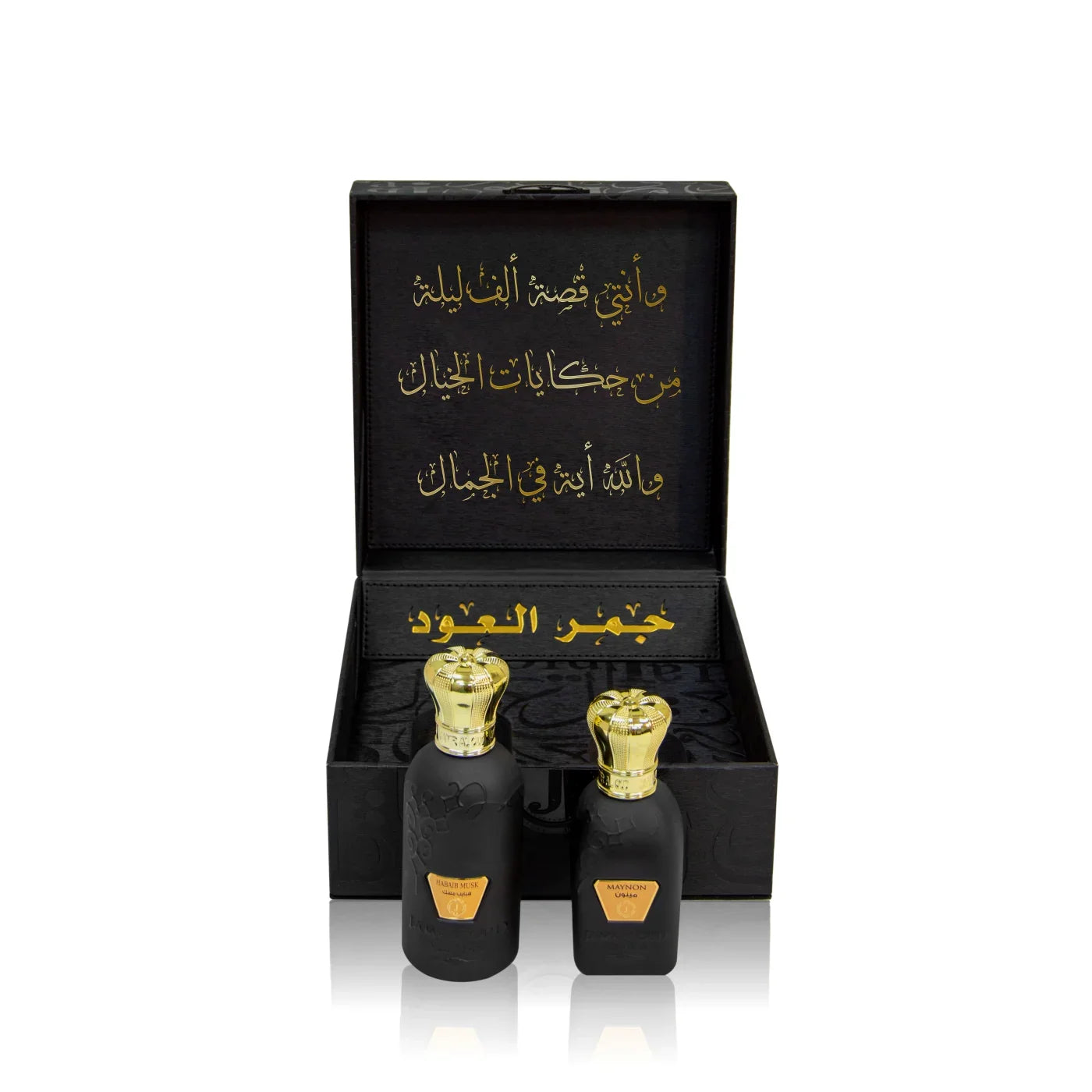 Luxury Jamr Al Oud gift box with two elegant black perfume bottles and gold caps
