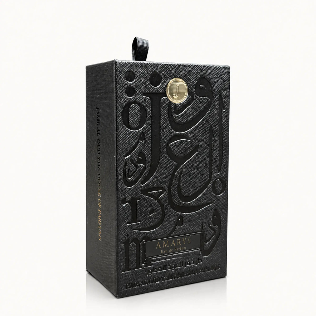 Amarys Perfume by Jamr Al Oud, black presentation box with embossed Arabic calligraphy and a gold emblem.