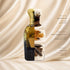 Ghawy Perfume by Jamr Al Oud, fragrance notes illustration; Top: Oud Oil Accord; Heart: Woody And Resinous Facets; Base: Deep Oud.